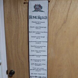 Tapestry Banner containing the HOME RULES